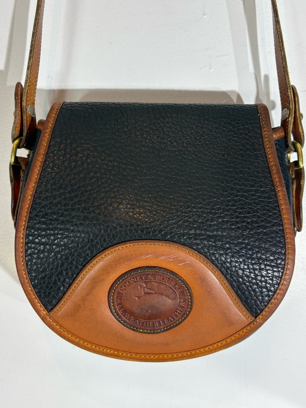 Vintage Dooney & Bourke All Weather Leather Crossbody Saddle Bag Black Tan